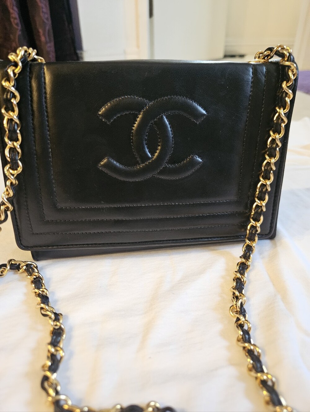 CHANEL Black Quilted Leather Crossbody with Gold Chain